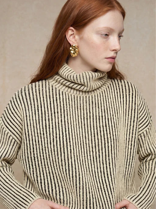 Red-haired AI model in a cream and black ribbed turtleneck knit with gold earrings, profile view