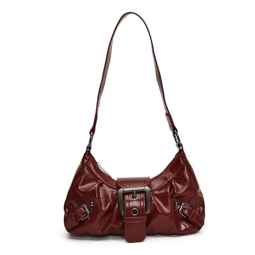 Packshot of a burgundy patent shoulder bag with buckle detail