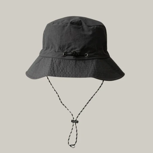 Packshot of a black bucket hat with drawstring cord before on-model generation