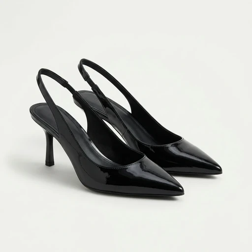 A pair of elegant black patent leather slingback heels with pointed toes and slender stiletto heels, displayed on a plain light-colored background, ideal for a chic, sophisticated fashion style.